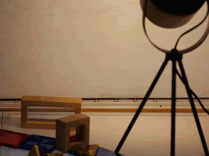 Lamp with colourful shapes under it on the ground